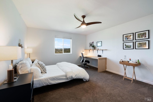 bedroom featuring ceiling fan and dark colored carpet