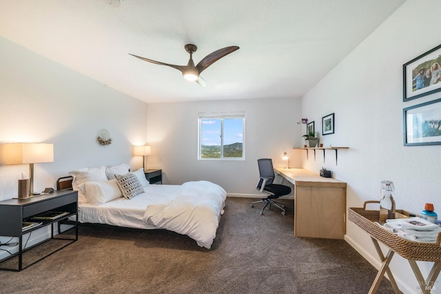 bedroom featuring ceiling fan and dark colored carpet