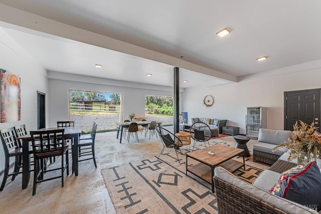 living room featuring beam ceiling