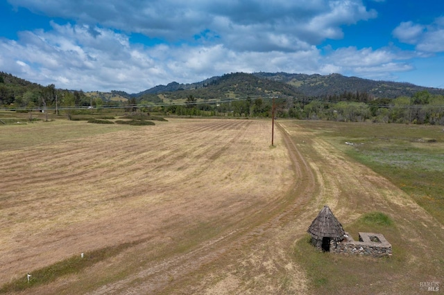 view of mountain feature with a rural view