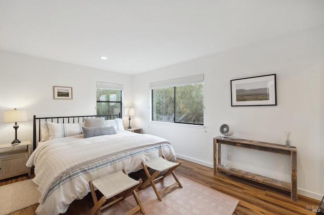 bedroom featuring dark wood-type flooring