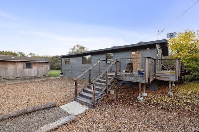 view of front of house with a deck