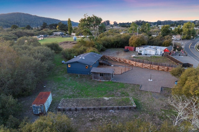 aerial view at dusk with a mountain view