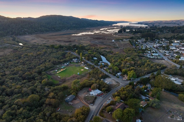 aerial view at dusk with a mountain view