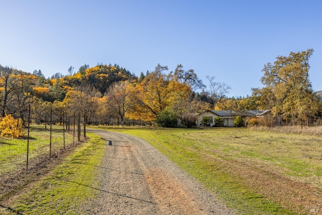 view of street featuring a rural view