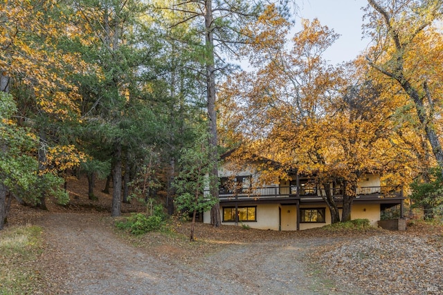 obstructed view of property featuring a deck