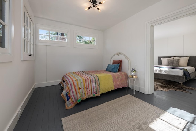 bedroom featuring dark hardwood / wood-style flooring