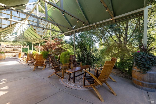 view of terrace featuring a pergola