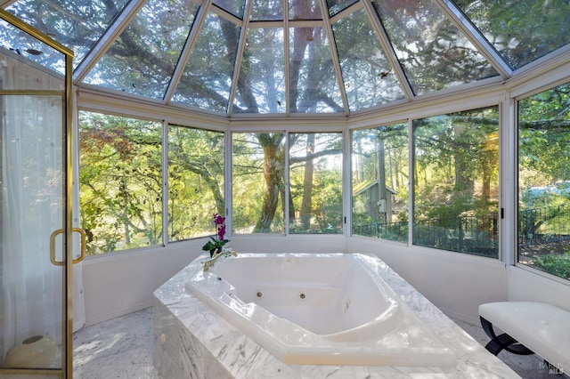 sunroom featuring a hot tub