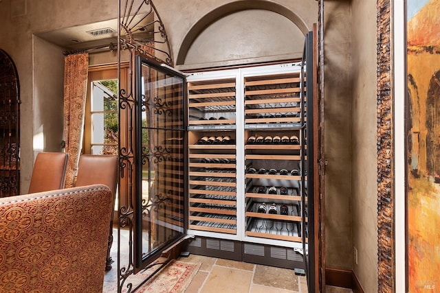 wine cellar with light tile floors