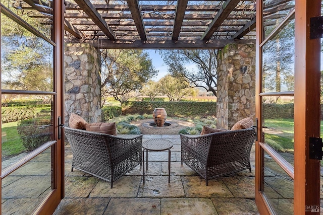 view of patio / terrace featuring a pergola