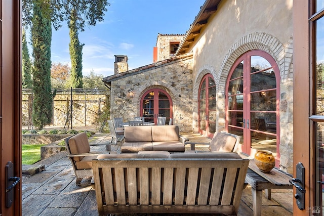 view of patio / terrace with french doors and outdoor lounge area