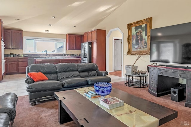 tiled living room with lofted ceiling