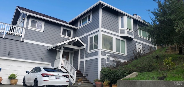 view of front of property with a garage