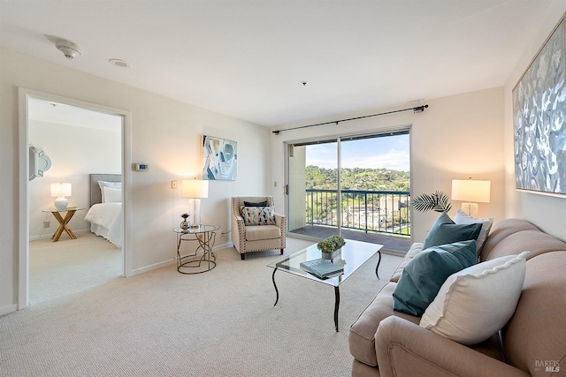 living room featuring light carpet