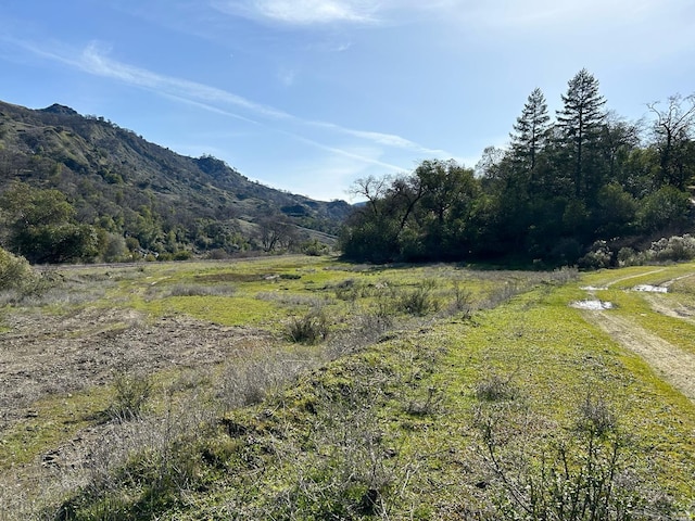 view of mountain feature featuring a rural view