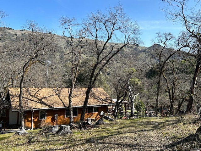 exterior space featuring a mountain view