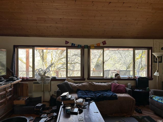 living room with lofted ceiling, wooden ceiling, and a wealth of natural light