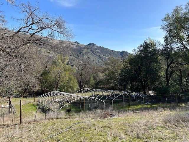 property view of mountains featuring a rural view