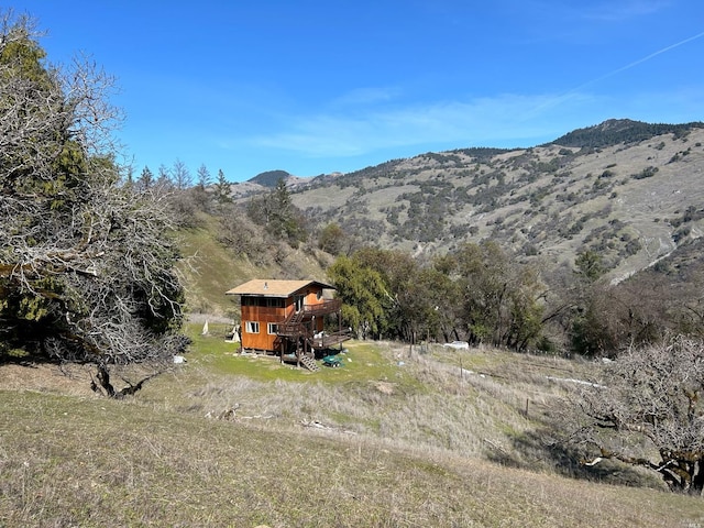 property view of mountains featuring a rural view