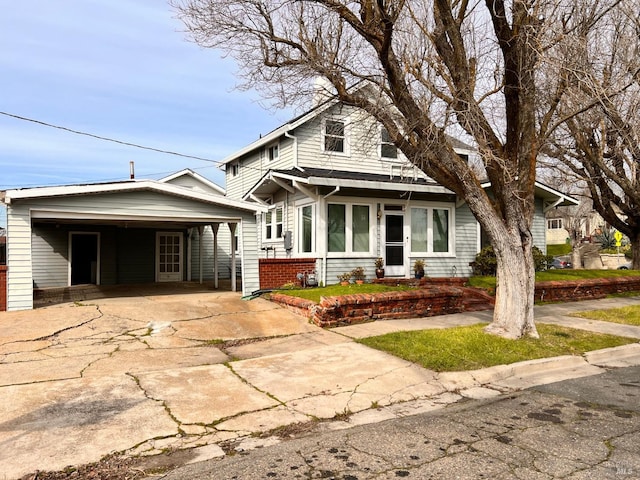 view of front of home featuring a carport