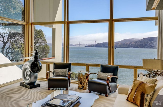 interior space featuring a water and mountain view