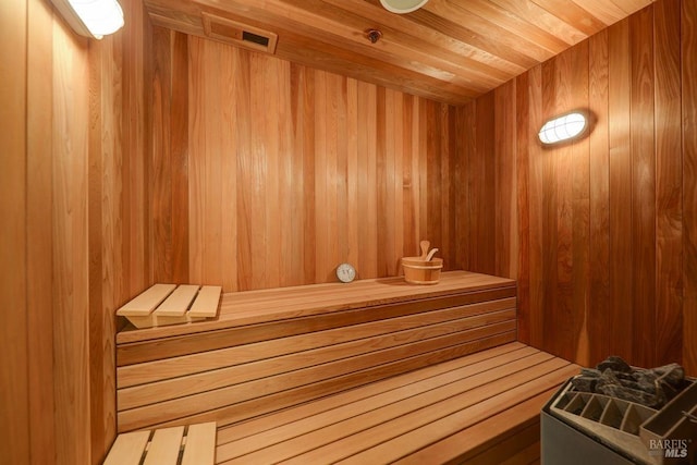 view of sauna with wood ceiling