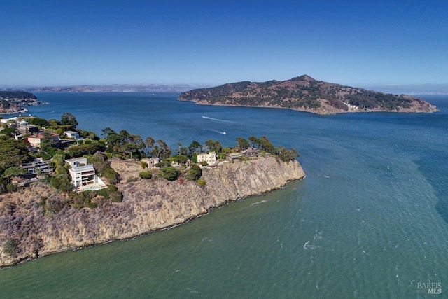 aerial view featuring a water and mountain view