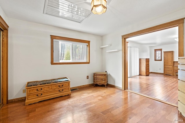 unfurnished bedroom with wood-type flooring