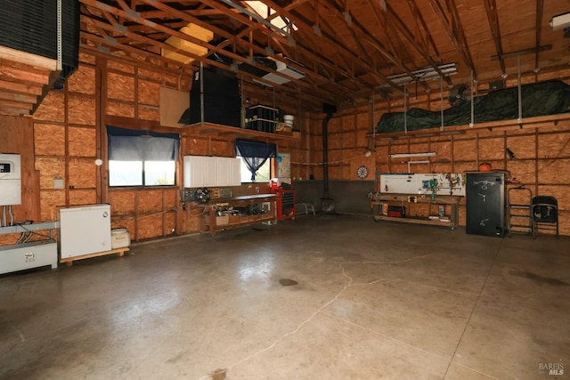 garage with a workshop area