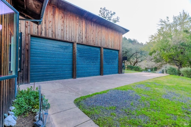 garage with a yard