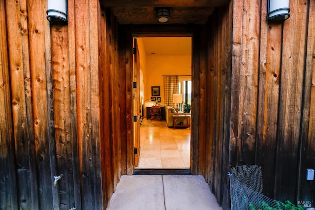 corridor with light tile floors