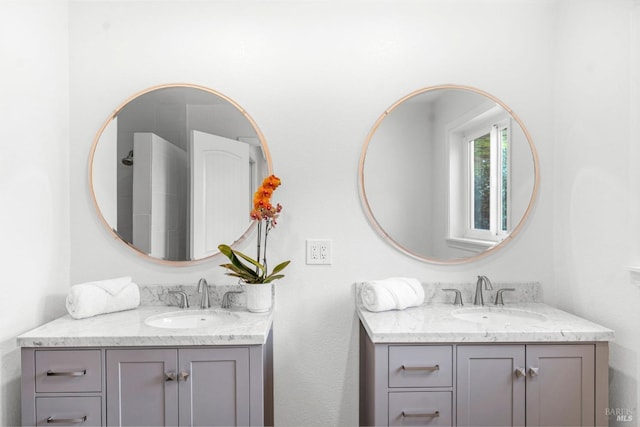 bathroom featuring vanity with extensive cabinet space