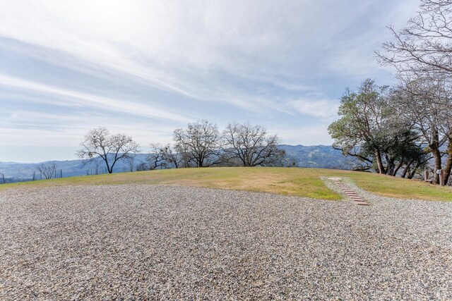 view of yard with a mountain view