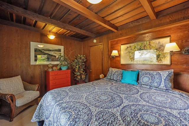 bedroom featuring beamed ceiling, wooden walls, and wood ceiling