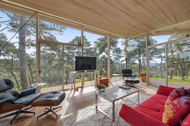 sunroom / solarium with wood ceiling and plenty of natural light