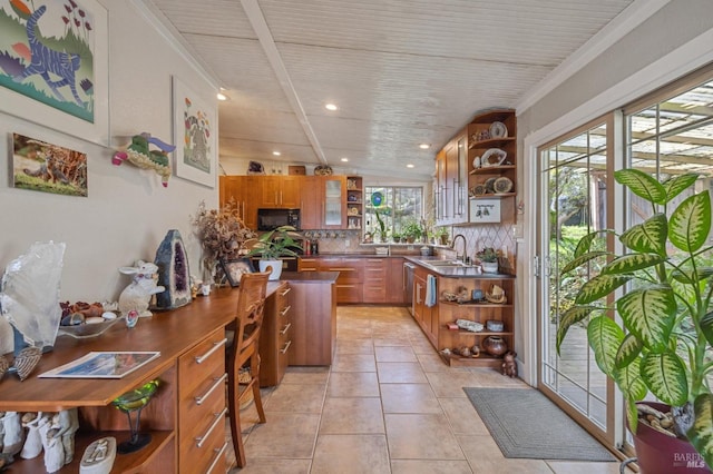 kitchen featuring sink, light tile patterned floors, backsplash, and crown molding