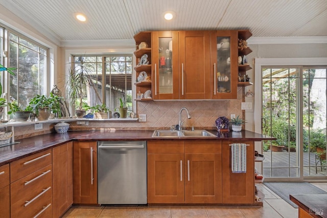 kitchen featuring dishwasher, decorative backsplash, sink, and ornamental molding