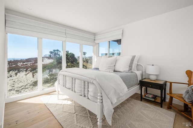 bedroom with wood finished floors