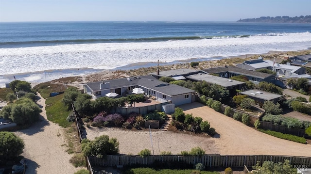 aerial view with a beach view and a water view