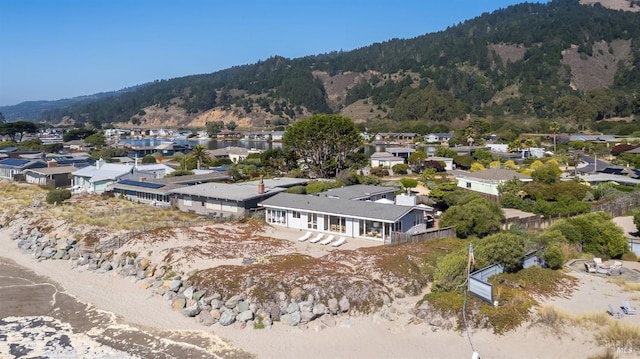 drone / aerial view featuring a mountain view and a residential view