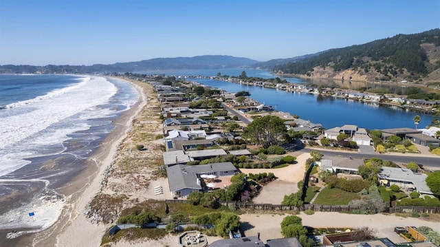 bird's eye view featuring a water and mountain view