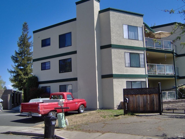 view of property featuring fence