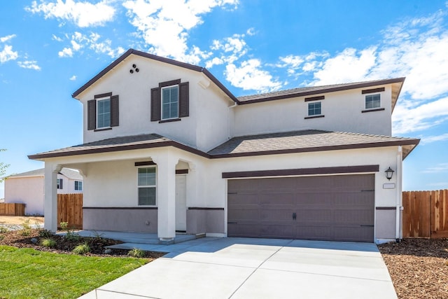 view of front of property with a garage, a shingled roof, concrete driveway, fence, and stucco siding