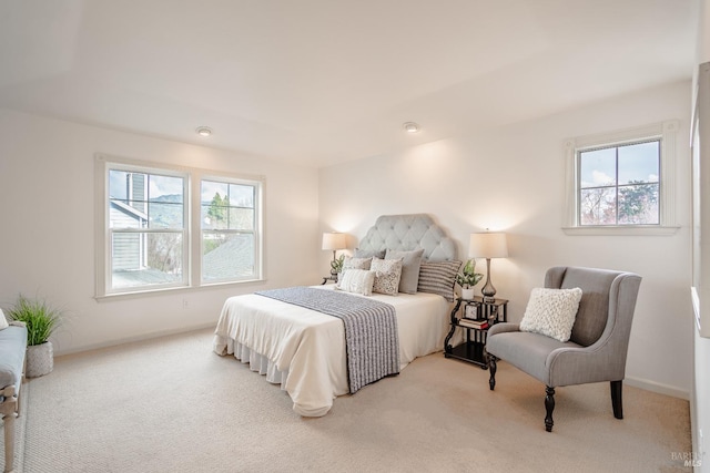 bedroom with light carpet