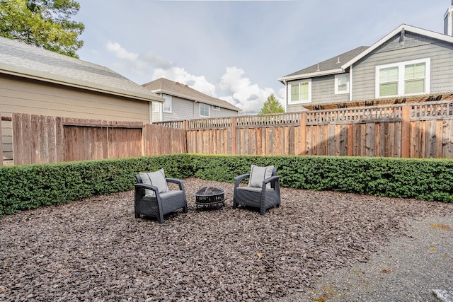 view of yard with an outdoor fire pit