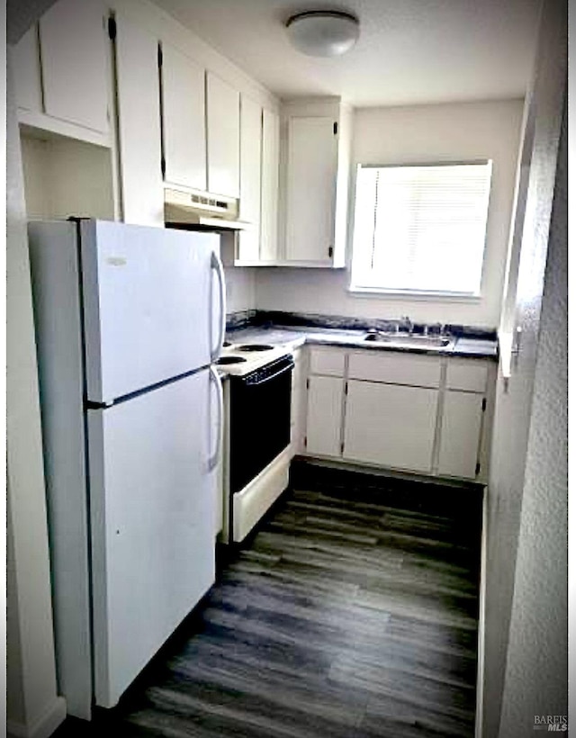 6687 Blue Heron Dr, Upper Lake, CA 95485 - kitchen with dark hardwood / wood-style flooring, white refrigerator, white cabinets, stove, and sink