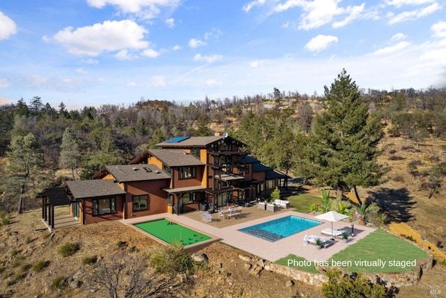 back of property with a patio area