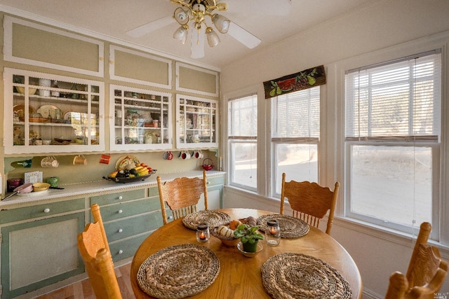 interior space featuring ceiling fan