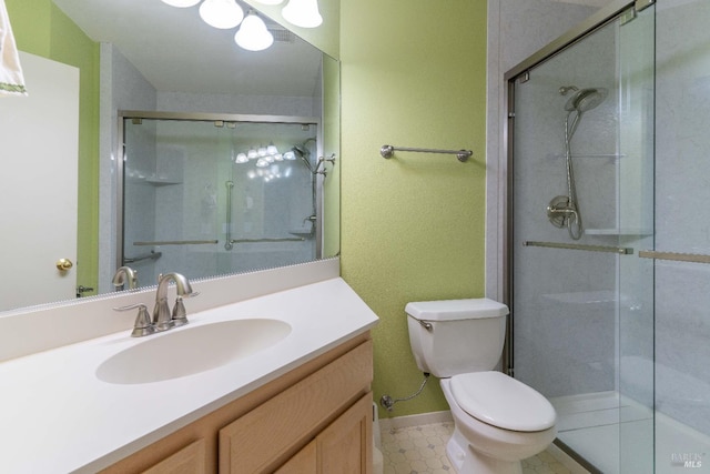 bathroom with an enclosed shower, toilet, and vanity